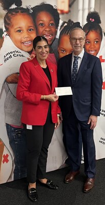 Celena Roldan Sarillo chief executive officer of the American Red Cross Greater New York Region with Mark Schienberg, president of the Greater New York Automobile Dealers Association at the Red Cross headquarters in Manhattan.