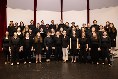 Dr. McKnight and his wife, Rosemary, stand with members of FHU's University Chorale.