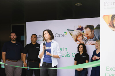 The CEO of Centene Pharmacy Services, Sarah Baiocchi, addresses AcariaHealth team members at the grand opening celebration.
