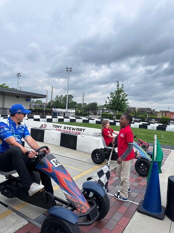 Crossing the Yard of Bricks at the miniature Indianapolis Motor Speedway at The Children's Museum of Indianapolis during the Month of May!