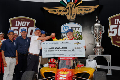 BorgWarner President and CEO Fred Lissalde awarded 2024 Indianapolis 500 winner Josef Newgarden with the Borg-Warner Trophy and Rolling Jackpot bonus for winning back-to-back races.