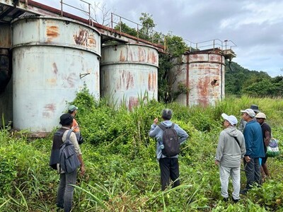 Inspecting old CIP tanks (CNW Group/Adyton Resources Corporation)