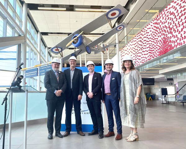Neil Pakey President and CEO, Nieuport Aviation, RJ Steenstra, President and CEO, PortsToronto, Sean Smithson, Toronto Regional Vice President, Pomerleau, Steven Tanguy, Managing Director, Alstef Canada, Sandra Pupatello, Board Chair, PortsToronto pose for a photo following the announcement. (CNW Group/Billy Bishop Toronto City Airport) Neil Pakey President and CEO, Nieuport Aviation, RJ Steenstra, President and CEO, PortsToronto, Sean Smithson, Toronto Regional Vice President, Pomerleau, Steven Tanguy, Managing Director, Alstef Canada, Sandra Pupatello, Board Chair, PortsToronto pose for a photo following the announcement. (CNW Group/Billy Bishop Toronto City Airport)