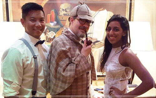 Image of a murder mystery event at the Holmes Hotel with Sherlock