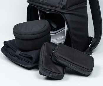 A padded accessory "hatbox," two removable accessory pouches, and a padded pocket, stow all Vision Pro accessories and keep the device securely in place