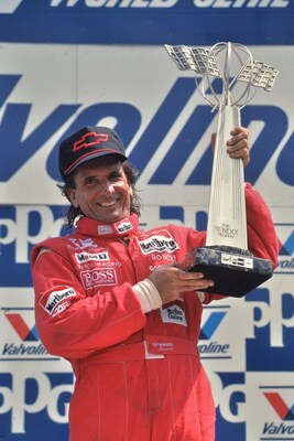 Emerson Fittipaldi on the podium after winning the 1989 Chevrolet Detroit Grand Prix presented by Lear. Photo courtesy Chevrolet Detroit Grand Prix presented by Lear.