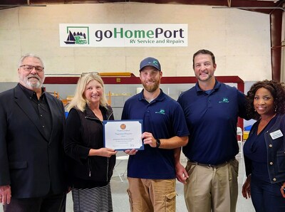 Left to Right: Macomb County Commissioner Gus Ghanam; Lisa Damon-Brown, Director of Community Relations for Congressman John James of Michigan’s 10th District; Mike Low, Operations Manager for goHomePort RV Service and Repairs accepting the Certificate of Special Congressional Recognition; Mike Douglas, President of goHomePort RV Service and Repairs; and Melody Magee, City of Warren Council Vice-President, on May 22, 2024.