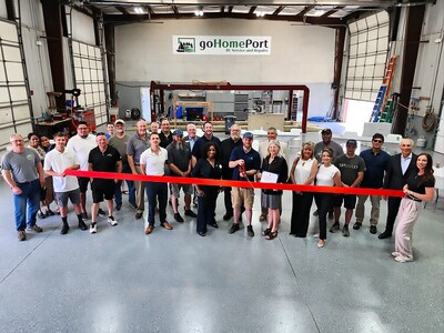 goHomePort RV Service and Repairs celebrates the grand opening of its sixth location and first in Michigan. Mike Low, goHomePort Operations Manager, prepares to cut the ribbon in Warren, MI, surrounded by goHomePort team members, local business leaders and community representatives.