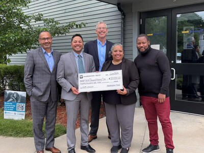 West Elmwood Housing Development Corporation (WEHDC) received a $20,000 grant from the Washington Trust Charitable Foundation to support several programs. From L to R: Rolando Lora, Executive Vice President, Chief Retail Lending Officer and Director of Community Lending at Washington Trust; Dariel Blanco, Deputy Director at WEHDC, Edward O. 