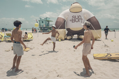 Guests playing soccer at Sun Bum's Miami Beach Takeover event