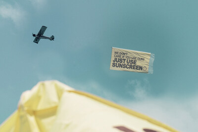 Just Use Sunscreen airplane banner at Sun Bum's Miami Beach Takeover event
