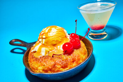 The Pineapple Upside Down Cake and Pineapple Upside Down Martini are part of Topgolf’s summer LTO lineup.