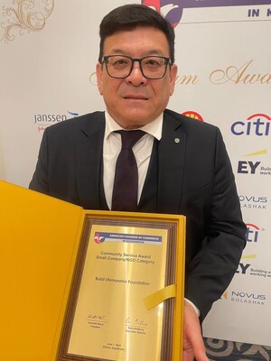 Marat Aitmagambetov, Director of the Bulat Utemuratov Foundation, stands with the Award - Photo Credit: Bulat Utemuratov Foundation