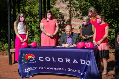 Governor Polis signs HB1164 with bill sponsors Rep. Brianna Titone (HD 27, Jefferson), Rep. Jenny Willford (HD 34, Adams), Sen. Janet Buckner (SD 29, Arapahoe), Sen. Faith Winter (SD 25, Adams, Broomfield, Weld) and coalition lead and founder and president of Justice Necessary, Diane Cushman Neal.