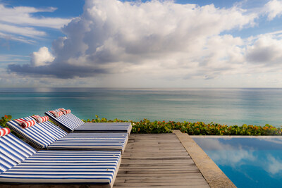 The infinity-edge Ocean Pool at The Ocean Club is adorned with the new Four Seasons + Jacquemus collaboration