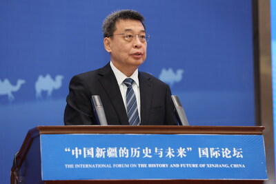 Pan Yue, director of the National Ethnic Affairs Commission, delivers a keynote speech at the International Forum on the History and Future of Xinjiang in Kashgar, Xinjiang on Wednesday. Jiang Dong/China Daily
