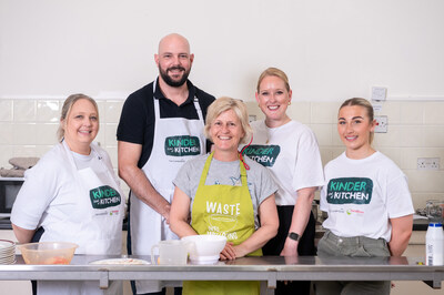 The Cumberland's Kinder Kind of Kitchen// Claire Wickham cooks Bobotie with volunteers at Kendal People's Cafe in Kendal Parish Hall. (l-r) Lyndsey Taylor, Cluster Manager Kendal Ambleside and Windermere; Nigel Taylor, head of Marketing and Brand; Claire Wickham of Kendal People's Cafe; Kelly Ashbridge External Communication Manager; Olivia Dewhirst, Assistant Cluster Manager Kendal Ambleside and Windermere. (PRNewsfoto/The Cumberland Building Society)