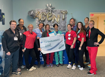 Cardiologist Lang Lin, MD, and her team from Morton Plant Hospital’s cardiac catheterization lab celebrate using a new tool to treat restenosis in Clearwater, Fla.