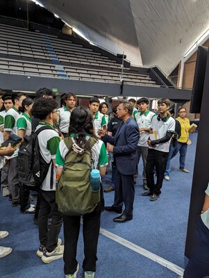 Ravi Arcot, VP and head of engineering at Ascendion, meets with students at the Ascendion Science Fair at Tecnológico de Monterrey university in Monterrey, Mexico, the Latin American headquarters of the AI-first software engineering services company.