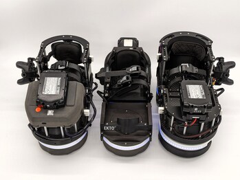 A lineup of EKTO VR's various robotic footwear models, showcasing the evolution and design differences between each version.