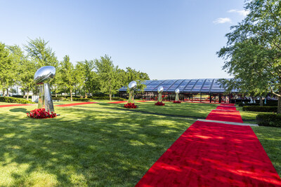 Lining the entrance to the venue were red carpets on both sides of a promenade which featured larger than life replicas of the Chiefs' four Lombardi Trophies. Photo credit: Matt Teuten