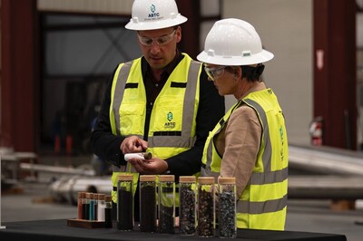 American Battery Technology Company CEO Ryan Melsert shows U.S. Department of Energy Secretary Jennifer Granholm battery metal products, including lithium, made from the company’s first-of-kind technologies utilized in its lithium ion battery recycling operations.