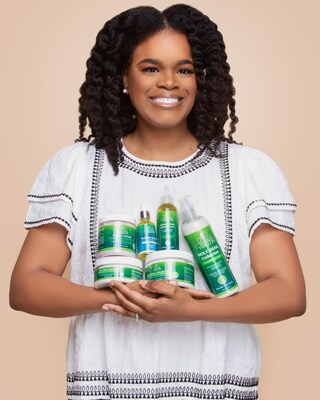 Ameka Coleman, Founder/CEO of Strands of Faith, showcasing the line of clean hair care products for textured hair.