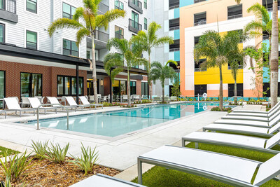 Amenities at Jade at North Hyde Park include a courtyard pool, fitness center with strength and cardio equipment, independent co-working spaces and onsite pet spa.