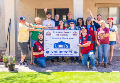 Photo of the Lowe's and Building Homes for Heroes team.
