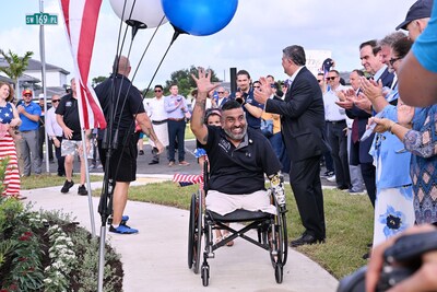 Lennar's Southeast Florida Division, Helping a Hero, and Bass Pro Shops welcomed SGT Luis Rosa-Valentin, USA (Ret.), a triple amputee injured by an explosion while on duty in Iraq, to his new adapted Lennar home in South Miami-Dade County. Photo Credit: Getty Images for Helping a Hero.