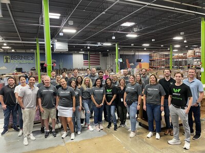 Wesco's team in Glenview, IL volunteering with Bernie's Book Bank in honor of the company's annual Day of Caring.