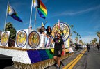 Employees celebrate on the City of Palm Springs float in the 2023 Palm Springs Pride Parade. Photo by Chad Sain.