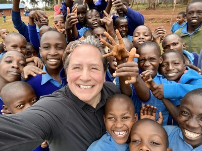Jim Poole, President & CEO of NuCalm during a visit to a school in Kenya
