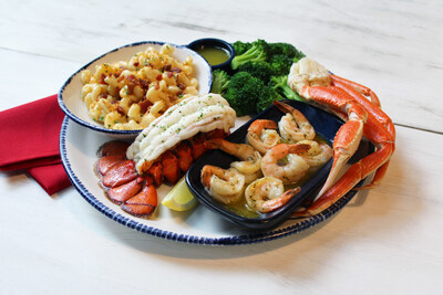 Flavor Flav’s Faves Signature Meal includes Maine Lobster Tail, Snow Crab Legs, Garlic Shrimp Scampi, Bacon Mac & Cheese all on one plate