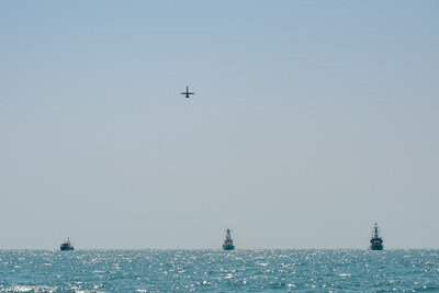 During Exercise New Horizon in the Arabian Gulf, October 2021, a V-BAT operates above Royal Bahrain Naval Force fast-attack craft RBNS Abdul Rahman Al-fadel (P 22), right, U.S. Coast Guard patrol boat USCGC Maui (WPB 1304), center, and a Bahrain coast guard patrol boat. U.S. Navy photo by Mass Communication Specialist 2nd Class Dawson Roth.