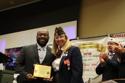 Veteran and Swagelok associate, Lawrence Walton accepts the VFW Employer of the Year award on the company's behalf.