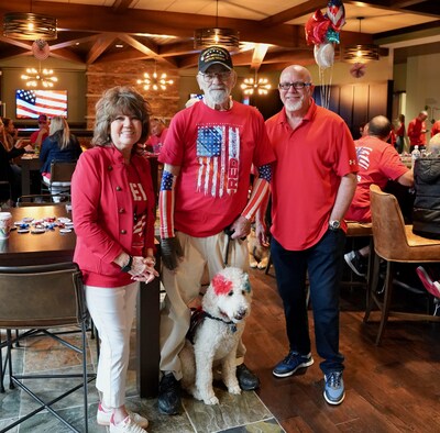 L-R: AWI CEO Louise Thaxton, Vietnam Army Veteran Vic with his dog Pearl, Fairway CEO and Founder Steve Jacobson (PRNewsfoto/Fairway Independent Mortgage Corporation)
