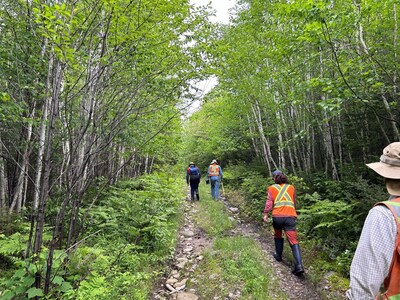 Figure 2 – Field Team on Access Track at Mazerac in Quebec (CNW Group/Power Metals Corp.)