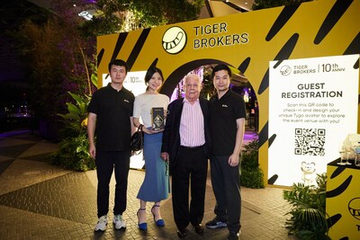 Dong Ming, Vice President and Co-Founder, and Wu Tianhua, Global CEO and Co-Founder of Tiger Brokers, with Soros Fund Management Co-Founder and Investor Jim Rogers (PRNewsfoto/Tiger Brokers Singapore)