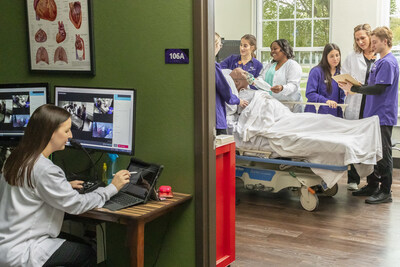 Students and faculty work in a simulator lab in ACU's School of Nursing. Photo by Jeremy Enlow.