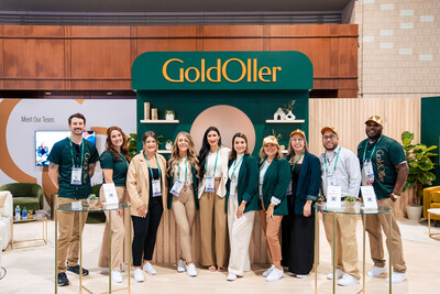 The GoldOller team at the National Apartment Association debuting its This is Home living room exhibit.
