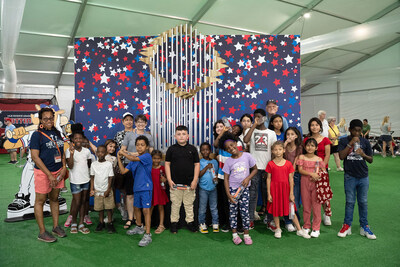 Young residents from Paddock on Park Row visit the All-Star Village during Major League Baseball’s All-Star Week.