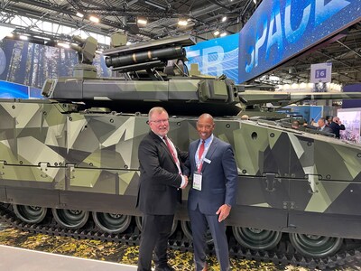 Tommy Gustafsson-Rask, Managing Director, BAE Systems Hägglunds and Dana Pittard, Vice President of Defense Programs, Allison Transmission (pictured left to right) stand before the Allison-equipped BAE CV90, widely regarded for crew and passenger protection, at the Eurosatory 2024 trade show in Paris.