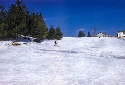 Early visitor at the Mirror Lake Inn skied on Dream Hill, right on the property