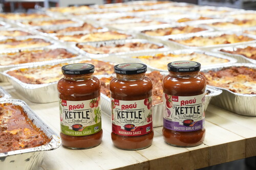 Lasagna Love volunteers will layer up their signature dish with RAGÚ® Kettle Cooked sauce in preparation for National Lasagna Day. RAGÚ Kettle Cooked sauces are available in a 24-ounce jar at select retailers across the U.S. Visit www.RAGU.com for recipes and more information on where to buy. (Charles Sykes/AP Images for RAGÚ®)