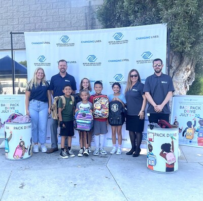 (L-R) North Island Credit Union Digital Marketing Coordinator Madison Lindley, Vice President/5th & Laurel Branch Manager Sean Swanson, Vice President/La Mesa Branch Manager Summer Yousif, and Administrative Services Associate Hayden Drum distribute backpacks to Boys & Girls Clubs of Greater San Diego Club kids.