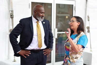 Houston Housing Authority President & CEO David A. Northern Sr. engages with community advocate Kimberly Phipps-Nichol at the Choice Neighborhoods Implementation Grant event.