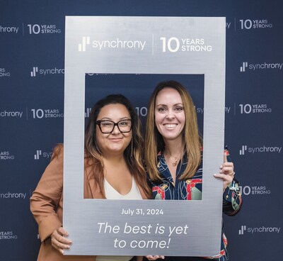 Celebrating 10 Years – On Wednesday July 31st, Synchrony marks a decade of success as a publicly traded company helping its employees, customers and communities thrive. Synchrony employees around the world celebrated the milestone, including Giehzi Jauregui (left) and Mikki Ortega (right) who are part of Synchrony's Altamonte Springs, Fla. hub. (Photo credit: Synchrony)