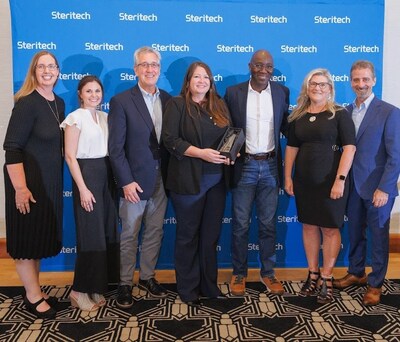 The First Watch Quality Assurance and Food Safety Team Members Accept the 2024 Excellence in Food Safety Award, Presented by Kimberly Hay, Director of Client Experience at Steritech (Far Left) and Alex Myrick, Vice President of Sales at Steritech (Far Right)