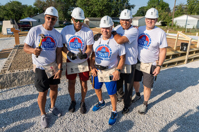 Pro Football Hall of Fame members volunteer to help raise the walls of a new Habitat for Humanity home being built for the Shoup family in Canton, OH. James Hardie sponsored the construction of the home as part of the countdown to the inaugural James Hardie™ Pro Football Hall of Fame Invitational, a new PGA TOUR Champions event that will tee off in the spring of 2025, featuring the legends of golf and football.